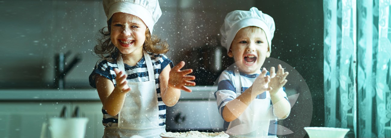 two children playing with dough